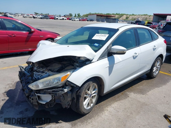 2016 Ford Focus SE z VIN 1FADP3F23GL338496, wystawiony jako IAAI lot #42333608 z przebiegiem 76 972 mil mil oraz . Historia ofert i sprzedaży dostępna na DreamBid. Obrazek 18.