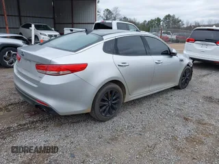 2016 Kia Optima EX z VIN 5XXGU4L36GG070336, wystawiony jako IAAI lot #41259692 z przebiegiem 124 807 mil mil oraz . Historia ofert i sprzedaży dostępna na DreamBid. Obrazek 4.