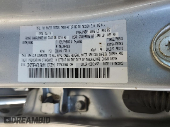 2019 Mazda 3 with VIN 3MZBPABL8KM112754, listed as a Copart auction lot 60616045 with 77,292 mi miles and Clean title. Bid and sale history available at DreamBid. Image 12.