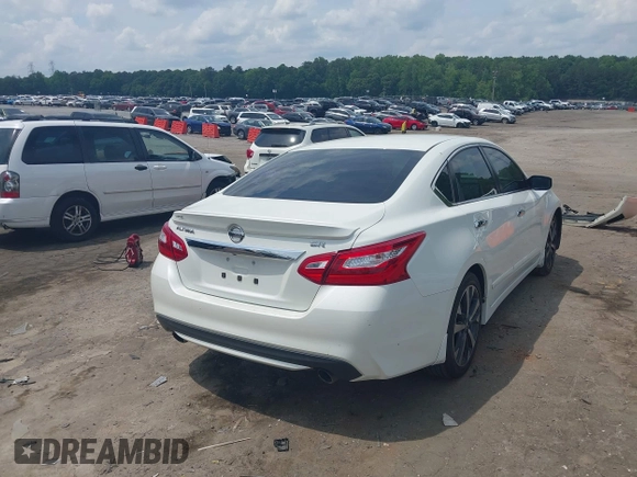 2016 Nissan Altima SR with VIN 1N4AL3AP7GC219688, listed as a IAAI auction lot 42267866 with 110,786 mi miles and . Bid and sale history available at DreamBid. Image 4.