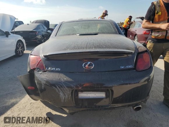 2002 Lexus SC 430 with VIN JTHFN48Y520034983, listed as a Copart auction lot 74084354 with 88,979 mi miles and Salvage Title. Bid and sale history available at DreamBid. Image 6.