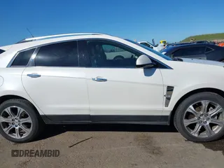 2012 Cadillac SRX Performance Collection с VIN 3GYFNEE33CS585109, выставлен на аукционе IAAI как лот 41657155 с пробегом 155 013 миль миль и . История ставок и продаж доступна на DreamBid. Изображение 14.