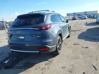 2022 Mazda CX-9 Grand Touring with VIN JM3TCBDYXN0625567, listed as a IAAI auction lot 41327380 with 50,672 mi miles and . Bid and sale history available at DreamBid. Image 4.