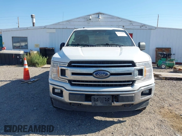 2018 Ford F-150 XL with VIN 1FTFW1E59JFC95665, listed as a IAAI auction lot 42512834 with 196,021 mi miles and . Bid and sale history available at DreamBid. Image 12.