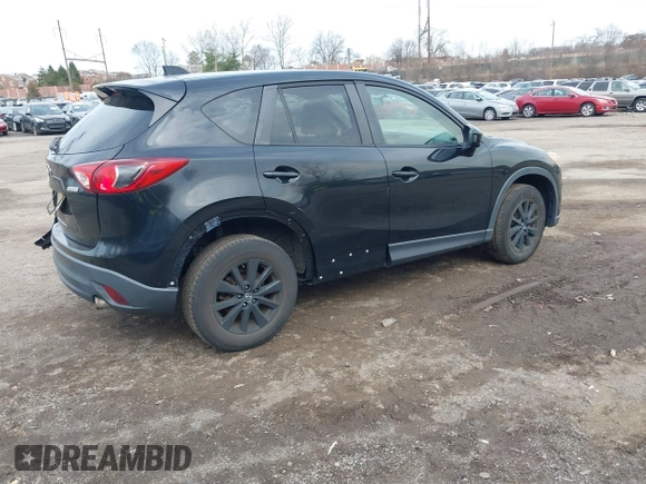 2015 Mazda CX-5 Touring with VIN JM3KE4CY2F0445178, listed as a IAAI auction lot 41828953 with 137,330 mi miles and . Bid and sale history available at DreamBid. Image 4.