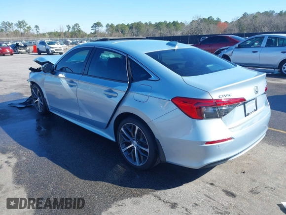 2022 Honda Civic Sedan Touring with VIN 2HGFE1F95NH312164, listed as a IAAI auction lot 41754518 with 84,384 mi miles. Bid and sale history available at carsss.com. Image 3.