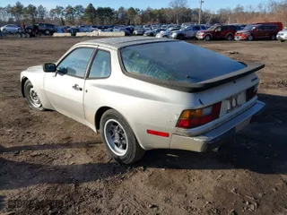 1984 Porsche 944 with VIN WP0AA0946EN453279, listed as a IAAI auction lot 41447115 with 102,553 mi miles. Bid and sale history available at carsss.com. Image 3.