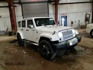 2015 Jeep Wrangler Unlimited Wrangler X with VIN 1C4HJWEG7FL671259, listed as a Copart auction lot 52334325 with 81,244 mi miles and Clean title. Bid and sale history available at DreamBid. Image 15.