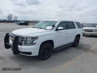 2020 Chevrolet Tahoe Commercial with VIN 1GNSKDEC9LR260983, listed as a IAAI auction lot 42062097 with 124,911 mi miles. Bid and sale history available at carsss.com. Image 17.