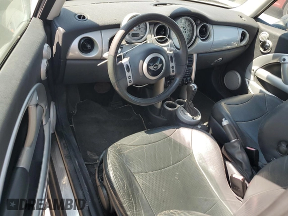 2003 MINI Hardtop with VIN WMWRC33453TE14909, listed as a Copart auction lot 65419725 with 111,960 mi miles and Salvage title. Bid and sale history available at DreamBid. Image 8.