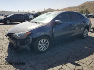 2019 Toyota Corolla L with VIN 2T1BURHE9KC239833, listed as a Copart auction lot 76793064 with 105,339 mi miles and Salvage title. Bid and sale history available at DreamBid. Image 1.