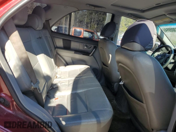 2007 Kia Sorento LX z VIN KNDJD736275669305, wystawiony jako Copart lot #85305954 z przebiegiem 217 513 mil mil oraz Szkoda całkowita • Salvage title. Historia ofert i sprzedaży dostępna na DreamBid. Obrazek 11.