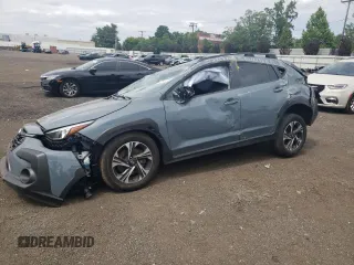 2024 Subaru Crosstrek Premium with VIN JF2GUADC0R8205427, listed as a Copart auction lot 60543245 with 28,707 mi miles and Salvage title. Bid and sale history available at DreamBid. Image 1.