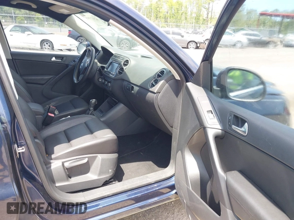 2012 Volkswagen Tiguan SEL with VIN WVGAV7AX7CW608637, listed as a IAAI auction lot 42173987 with 149,013 mi miles and . Bid and sale history available at DreamBid. Image 5.