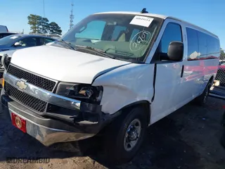 2017 Chevrolet Express Passenger LT with VIN 1GAZGPFG2H1227477, listed as a IAAI auction lot 40849214 with 207,488 mi miles. Bid and sale history available at carsss.com. Image 18.