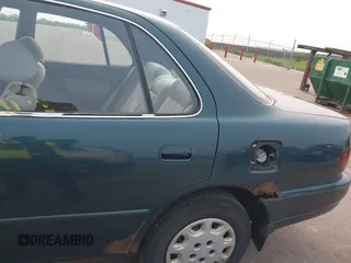 1996 Toyota Camry DX z VIN JT2BG12K0T0417267, wystawiony jako IAAI lot #42386332 z przebiegiem 222 688 mil mil oraz . Historia ofert i sprzedaży dostępna na DreamBid. Obrazek 6.