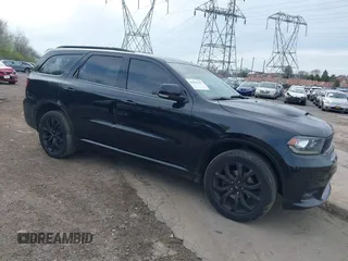 2019 Dodge Durango GT Plus with VIN 1C4RDJDG6KC561099, listed as a IAAI auction lot 41963187 with 104,153 mi miles and . Bid and sale history available at DreamBid. Image 1.