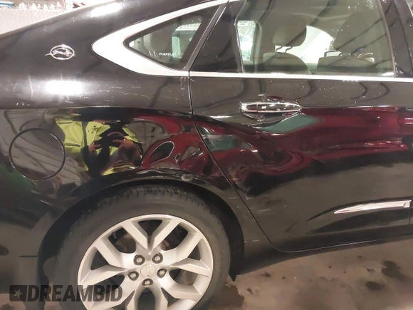 2017 Chevrolet Impala Premier with VIN 2G1145S39H9165231, listed as a IAAI auction lot 41874402 with 110,124 mi miles and . Bid and sale history available at DreamBid. Image 18.