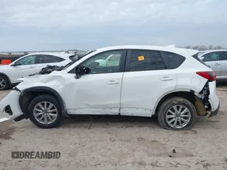 2016 Mazda CX-5 Touring with VIN JM3KE2CY1G0888850, listed as a IAAI auction lot 41562701 with 1 mi miles. Bid and sale history available at carsss.com. Image 14.