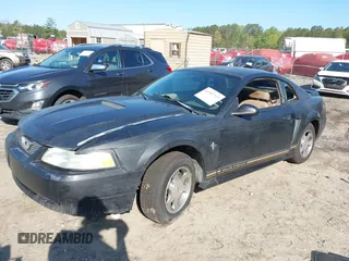 2000 Ford Mustang z VIN 1FAFP404XYF217165, wystawiony jako IAAI lot #41997215 z przebiegiem Nie podano mil oraz . Historia ofert i sprzedaży dostępna na DreamBid. Obrazek 17.