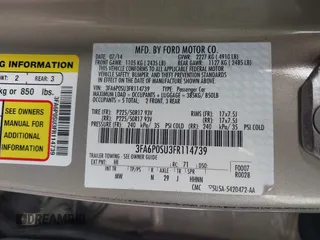 2015 Ford Fusion Energi Titanium with VIN 3FA6P0SU3FR114739, listed as a IAAI auction lot 42003011 with 120,553 mi miles. Bid and sale history available at carsss.com. Image 9.