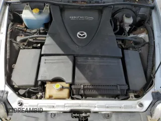 2005 Mazda RX-8 z VIN JM1FE17N650156229, wystawiony jako Copart lot #56708575 z przebiegiem Nie podano mil oraz Tytuł czysty. Historia ofert i sprzedaży dostępna na DreamBid. Obrazek 11.
