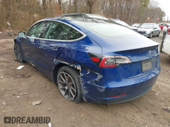 2020 Tesla Model 3 Standard Range Plus with VIN 5YJ3E1EA1LF658521, listed as a IAAI auction lot 41804722 with 83,248 mi miles and . Bid and sale history available at DreamBid. Image 3.