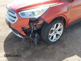 2019 Ford Escape Titanium with VIN 1FMCU9J92KUB28895, listed as a IAAI auction lot 42065235 with 112,305 mi miles and . Bid and sale history available at DreamBid. Image 6.