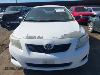 2010 Toyota Corolla with VIN 1NXBU4EE5AZ252874, listed as a IAAI auction lot 41812683 with 135,492 mi miles. Bid and sale history available at carsss.com. Image 6.