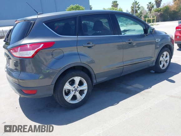2015 Ford Escape SE with VIN 1FMCU0G78FUC43685, listed as a IAAI auction lot 42189242 with 81,437 mi miles. Bid and sale history available at carsss.com. Image 4.