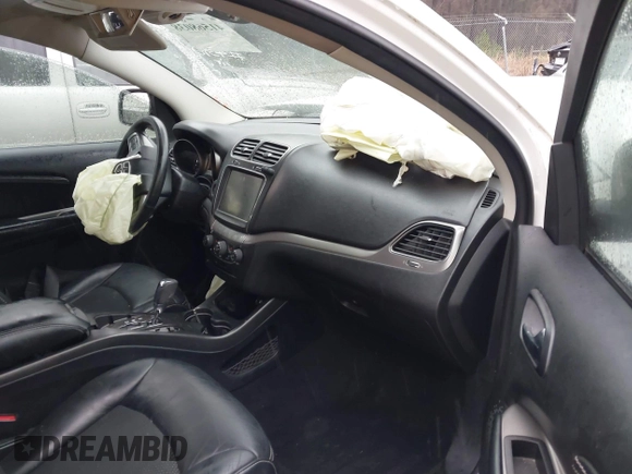 2015 Dodge Journey Crossroad with VIN 3C4PDCGG1FT548706, listed as a IAAI auction lot 41568038 with 142,435 mi miles and . Bid and sale history available at DreamBid. Image 5.
