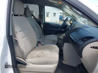 2017 Dodge Grand Caravan SE with VIN 2C7WDGBG3HR828825, listed as a IAAI auction lot 42048885 with 231,690 mi miles and . Bid and sale history available at DreamBid. Image 5.