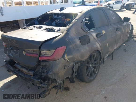 2019 BMW 3 Series 330i with VIN WBA5R1C58KFH10594, listed as a IAAI auction lot 41501625 with Not Provided miles and . Bid and sale history available at DreamBid. Image 4.