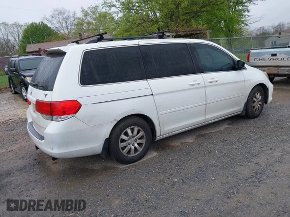 2010 Honda Odyssey EX-L with VIN 5FNRL3H65AB068497, listed as a IAAI auction lot 42013925 with 206,668 mi miles. Bid and sale history available at carsss.com. Image 4.