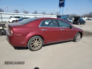 2011 Chevrolet Malibu LTZ with VIN 1G1ZE5E79BF206860, listed as a Copart auction lot 48797055 with 220,059 mi miles and Salvage Title. Bid and sale history available at DreamBid. Image 3.