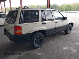 1997 Jeep Grand Cherokee Laredo z VIN 1J4GZ58S7VC737980, wystawiony jako IAAI lot #42256142 z przebiegiem 188 958 mil mil oraz . Historia ofert i sprzedaży dostępna na DreamBid. Obrazek 4.