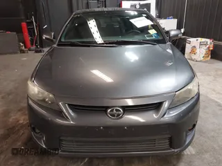 2012 Scion tC with VIN JTKJF5C7XC3034998, listed as a IAAI auction lot 41591632 with 171,121 mi miles. Bid and sale history available at carsss.com. Image 12.