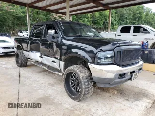2004 Ford F-250 XL with VIN 1FTNW21P94EC60823, listed as a Copart auction lot 59985235 with 271,459 mi miles and Salvage title. Bid and sale history available at DreamBid. Image 4.