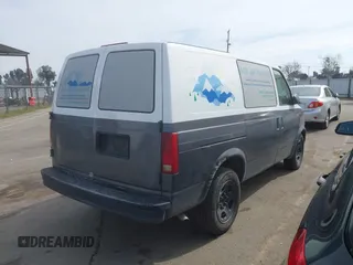 2004 Chevrolet Astro Cargo Van with VIN 1GCDM19X74B109660, listed as a IAAI auction lot 41616125 with 228,646 mi miles. Bid and sale history available at carsss.com. Image 4.