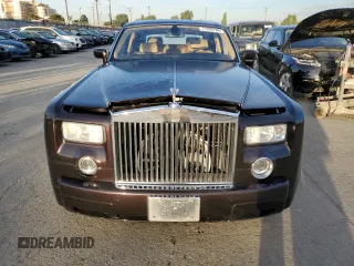 2006 Rolls-Royce Phantom z VIN SCA1S684X6UX08208, wystawiony jako Copart lot #77905764 z przebiegiem 108 986 mil mil oraz Szkody całkowita. Historia ofert i sprzedaży dostępna na DreamBid. Obrazek 5.
