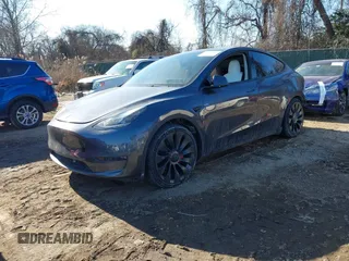 2023 Tesla Model Y Performance with VIN 7SAYGDEF1PF674417, listed as a IAAI auction lot 41421594 with 28,928 mi miles and . Bid and sale history available at DreamBid. Image 22.