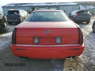 2002 Cadillac Eldorado z VIN 1G6EC12972B106132, wystawiony jako Copart lot #86799624 z przebiegiem 75 334 mil mil oraz Szkoda całkowita • Salvage title. Historia ofert i sprzedaży dostępna na DreamBid. Obrazek 6.