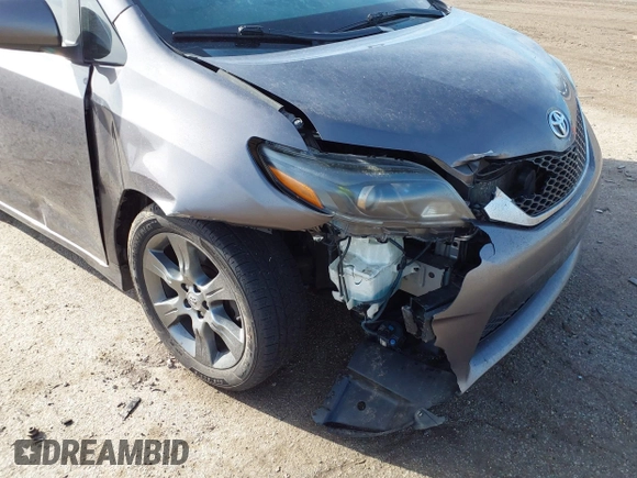 2015 Toyota Sienna SE with VIN 5TDXK3DC8FS633124, listed as a IAAI auction lot 41475935 with 182,921 mi miles and . Bid and sale history available at DreamBid. Image 6.