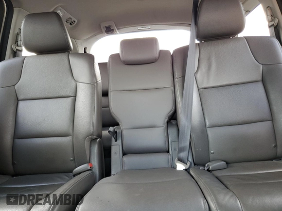 2014 Honda Odyssey Touring with VIN 5FNRL5H97EB097771, listed as a Copart auction lot 51664455 with 109,830 mi miles and Salvage Title. Bid and sale history available at DreamBid. Image 10.