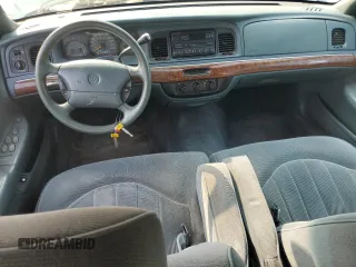 1997 Mercury Grand Marquis GS z VIN 2MELM74W2VX663313, wystawiony jako Copart lot #59539665 z przebiegiem 260 024 mil mil oraz Czysty tytuł • Clean title. Historia ofert i sprzedaży dostępna na DreamBid. Obrazek 8.