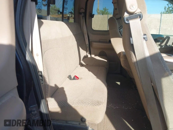 1999 Ford F-150 XL with VIN 1FTRX17L5XKB39130, listed as a IAAI auction lot 42041520 with Not Provided miles. Bid and sale history available at carsss.com. Image 8.