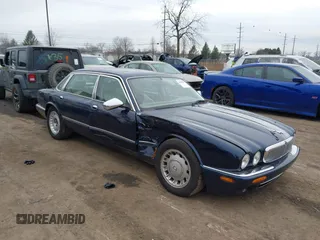 1998 Jaguar XJ Vanden Plas with VIN SAJKX6246WC832202, listed as a IAAI auction lot 41218807 with 96,589 mi miles and . Bid and sale history available at DreamBid. Image 1.