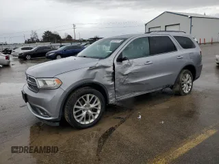2014 Dodge Durango Citadel with VIN 1C4RDJEG5EC500930, listed as a Copart auction lot 45609475 with 156,839 mi miles and Salvage Title. Bid and sale history available at DreamBid. Image 1.