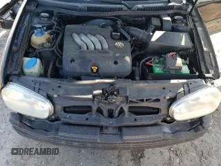 1999 Volkswagen GTI z VIN WVWDC31J3XW349033, wystawiony jako Copart lot #82294274 z przebiegiem 234 259 mil mil oraz Szkoda całkowita • Salvage title. Historia ofert i sprzedaży dostępna na DreamBid. Obrazek 11.