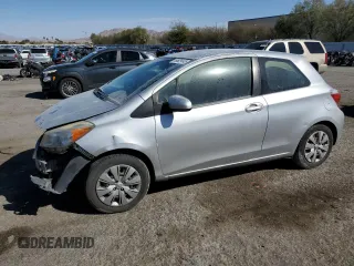 2012 Toyota Yaris L z VIN JTDJTUD36CD501205, wystawiony jako Copart lot #49529145 z przebiegiem 307 992 mil mil oraz Szkoda całkowita • Salvage title. Historia ofert i sprzedaży dostępna na DreamBid. Obrazek 1.